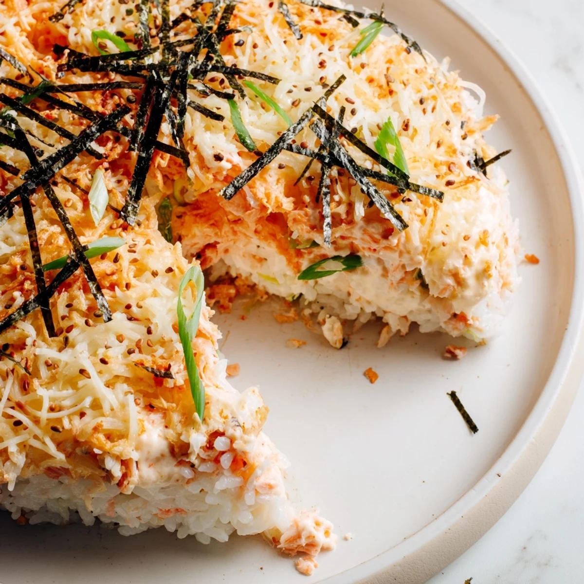 Golden, bubbly Creamy Salmon Sushi Bake, a deconstructed sushi casserole, ready to serve and enjoy.