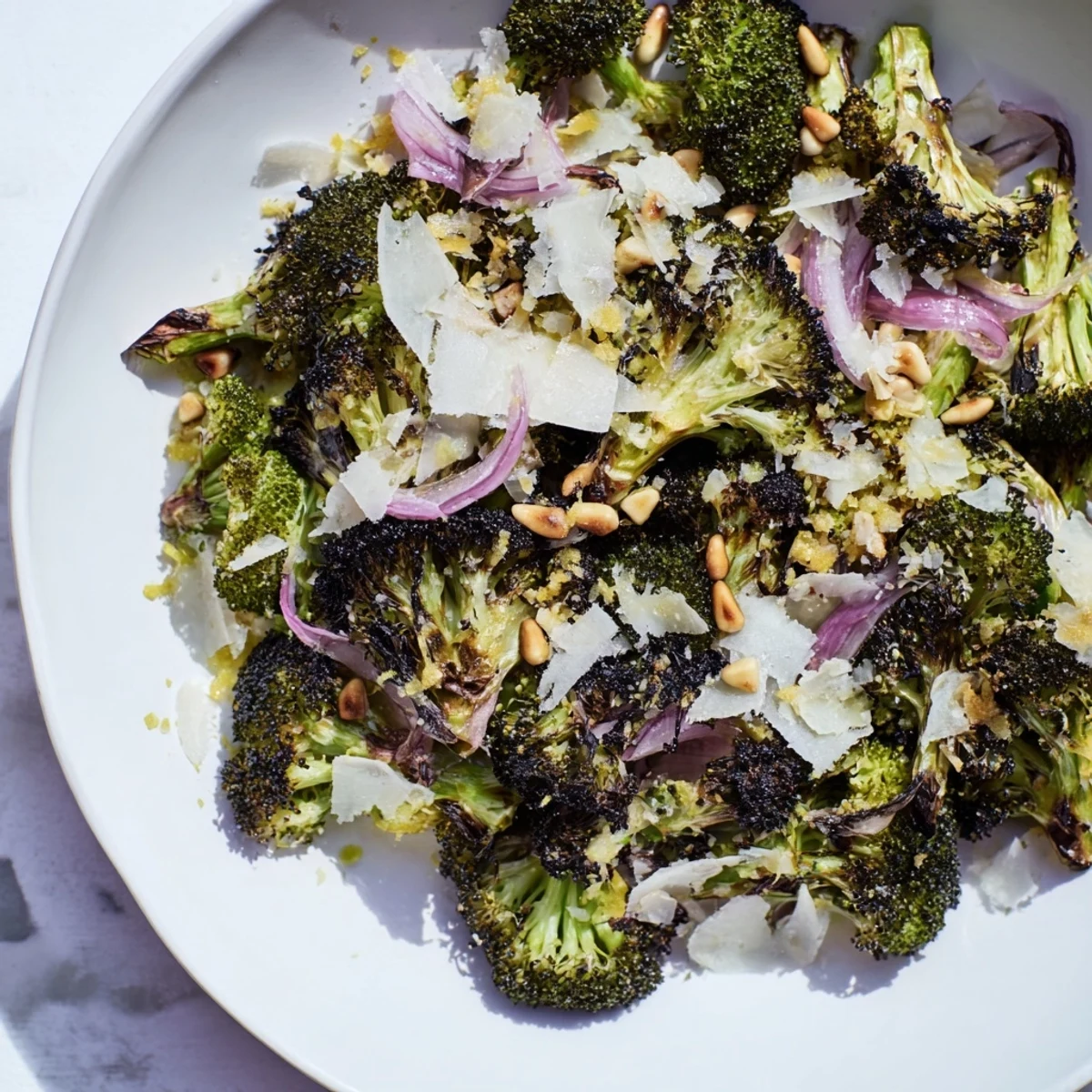A flavorful Charred Broccoli Salad with smoky edges, drizzled in zesty lemon dressing.