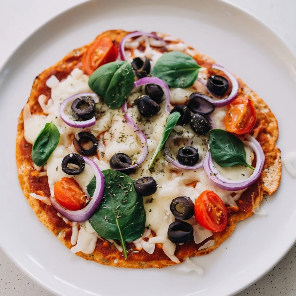 Crispy Tortilla Pizza with melted cheese, fresh toppings, and a golden, crunchy crust.