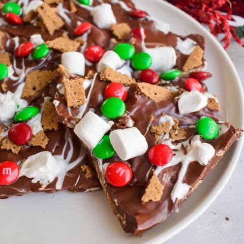 Quick Christmas Smores Bark with melty marshmallows and festive sprinkles, ready to break and enjoy.